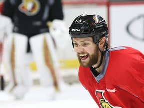 Zack Smith of the Ottawa Senators smiles after missing a pass during practice at Canadian Tire Centre in Ottawa on April 4, 2016. (Jean Levac/Postmedia)