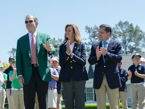Augusta National chairman Billy Payne acknowledges the applause from patrons and USGA president Diana M. Murphy (center) and PGA president Derek Sprague during the 2016 Drive, Chip and Putt Championship at Augusta National GC. (Michael Madrid/USA TODAY Sports)
