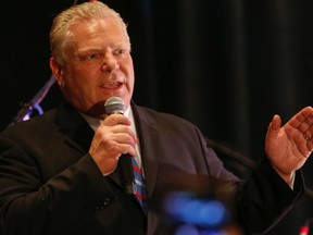 Doug Ford speaks during the Rob Ford Celebration of Life party at the Toronto Congress Centre Wednesday, March 30, 2016. (Dave Thomas/Toronto Sun)