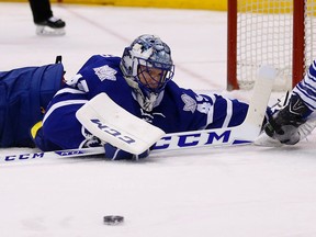 Jonathan Bernier is down as Leafs host the Florida Panthers in Toronto on Thursday March 10, 2016. (Michael Peake/Toronto Sun/Postmedia Network)