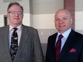 Dr. Martin Queen (left) spoke Monday to students at Cambrian College, many of whom are in the police foundations program co-ordinated by former, long-time Ontario Provincial Police officer David Lalonde. Carol Mulligan/The Sudbury Star