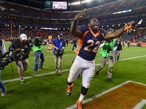 Denver Broncos running back C.J. Anderson celebrates following the win over the Green Bay Packers at Sports Authority Field at Mile High in Denver on Nov. 1, 2015. (Ron Chenoy/USA TODAY Sports)