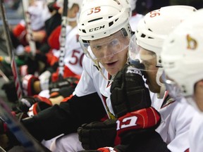 Ottawa Senators winger Buddy Robinson chats up teammates during the third period of a game at the 2014 Rookie Tournament in London, Ont. on Sept. 13, 2014. (DEREK RUTTAN/Postmedia)