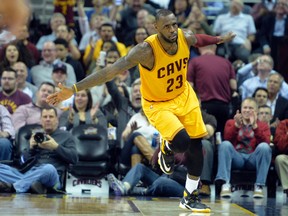 Cleveland Cavaliers forward LeBron James reacts after a dunk in the second quarter against the Brooklyn Nets at Quicken Loans Arena in Cleveland on March 31, 2016. (David Richard/USA TODAY Sports)