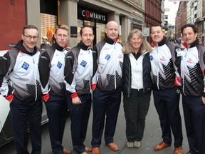Canadian travel writer Janie Robinson poses with Team Canada in Basel, Switzerland, where the team is leading in the race for the 2016 World Men's Curling Championship. BRIAN QUIIN/Special to Postmedia Network