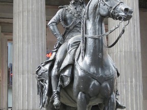 Pranksters keep putting orange-and-white road traffic cones on the head of 1844 equestrian statue of Arthur Wellesley, the 1st Duke of Wellington, whose forces defeated Emperor Napoleon at the Battle of Waterloo in Belgium in 1815. IAN ROBERTSON/Special to Postmedia Network