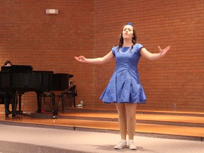 Kassidy Davies from Woodstock performs the song My New Philosophy from You're a Good Man, Charlie Brown, during the first day of the Woodstock Rotary Festival of Music on Tuesday, April 5, 2016. (MEGAN STACEY/Sentinel-Review)