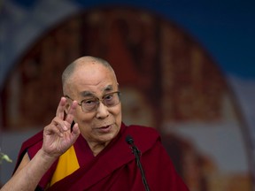 Tibetan spiritual leader the Dalai Lama speaks during a celebration to mark the 100 years of Tibetan Medical and Astrological Institute in Dharamsala, India, Wednesday, March 23, 2016. The institute, called Men-Tsee-Khang in Tibetan, was founded in 1916 by the 13th Dalai Lama in Lhasa. After his exile, the 14th Dalai Lama reestablished the institute in 1961 in India. (AP Photo /Tsering Topgyal)