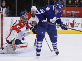 Maple Leafs forward Colin Greening tries to locate the puck in front of Panthers goalie Al Montoya on Monday night at the Air Canada Centre. Greening had two goals in the game. (USA Today Sports)