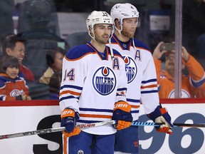 Edmonton Oilers Jordan Eberle, left, and Taylor Hall during a pre-game skate in Calgary. (Al Charest/Postmedia Network)