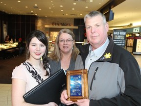 Jason Miller/The Intelligencer
Chris Macdonald (centre), co-founder of  Violence Awareness and Random Acts of Kindness (VARAK) Week, stands with Kindness Student of the Year Katie Sole and Mike Alexander, the Kindness Citizen of the Year.