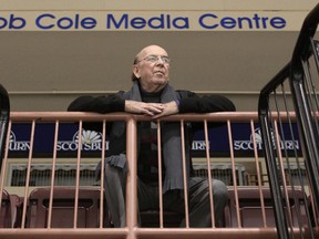 Legendary NHL play-by-play commentator Bob Cole is pictured at Mile One Centre in St. John's, NL, Tuesday, February 8th, 2011, seated below the Bob Cole Media Centre unveiled in 2001. FILE