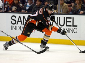Anaheim Ducks center Ryan Kesler (17) controls the puck in the second period of the game against the Calgary Flames at Honda Center.