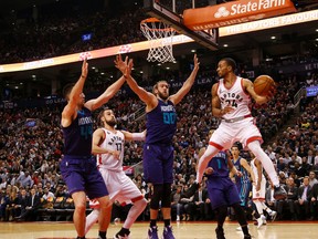 Raptors' Norman Powell looks for a pass as the Raptors host the Charlotte Hornets in NBA action in Toronto, Ont. on Monday April 4, 2016. (Michael Peake/Toronto Sun/Postmedia Network)