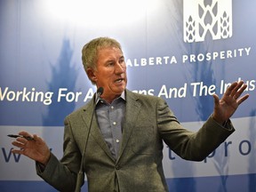 Alberta Prosperity Fund spokes person, Dave Rutherford, former radio personality and long-time conservative speaking at a public unity meeting to lead a charge of unity between the PCs and Wildrose by meeting with grassroots supporters of both parties in Edmonton, Tuesday. (ED KAISER)