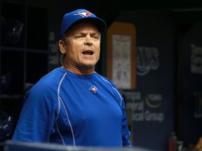 Toronto Blue Jays manager John Gibbons speaks to an umpire during the eighth inning against the Tampa Bay Rays at Tropicana Field on Monday. (Kim Klement-USA TODAY Sports)