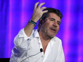 Judge Simon Cowell speaks at a panel for the television show "America's Got Talent" during the NBCUniversal summer press day in Westlake Village, California April 1, 2016.    REUTERS/Mario Anzuoni