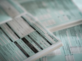 The T1 General tax form for 2015 is shown in this recent photo. Tax season is upon us once again and the Canada Revenue Agency has implemented several new measures in an effort to help streamline the filing of income tax returns. THE CANADIAN PRESS/Graeme Roy