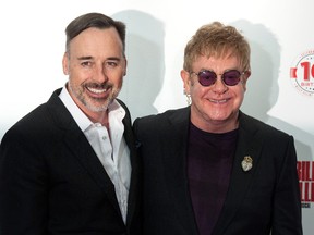 Canadian David Furnish with husband Elton John. (WENN.COM)