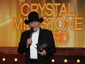 Merle Haggard accepts the Crystal Milestone Award at the 49th Annual Academy of Country Music Awards in Las Vegas, Nevada, in this file photo taken April 6, 2014.  Haggard has died at the age of 79, according to news reports.    REUTERS/Robert Galbraith/Files