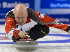 Canada's skip Kevin Koe  competes during a round robin match between Canada and Sweden  at the men's curling  World Championships 2016 in  Basel, Switzerland, on Wednesday, April 6, 2016. (Georgios Kefalas/Keystone via AP)