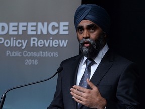 Defence Minister Harjit Sajjan holds a press conference at National Defence Headquaters in Ottawa on Wednesday, April 6, 2016, to discuss open and transparent public consultations on Canada‚Äôs defence policy. THE CANADIAN PRESS/Sean Kilpatrick