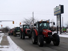 Submitted photo: A line of tractors make their way into the County Fair Mall parking lot in December of 2005 for a farmers' rally. It was one of the first large-scale agricultural protests in the province. More were held, including a large protest in Ottawa in April 2006.