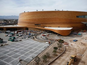In this March 3, 2016, photo, work continues on T-Mobile Arena in Las Vegas. MGM officials think they will hit the jackpot with a new $375 million arena that sits in the middle of the glittering Las Vegas Strip. (AP Photo/John Locher)