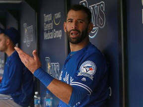 Jose Bautista reacts in the dugout against Rays yesterday. We are pretty sure he won’t be wearing a dress any time soon. (USA TODAY)