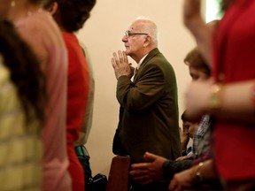 Iraqi Christians pray during Easter Mass at Baghdad's Christian Union Evangelical Church on March, 27. (AP Photo/Karim Kadim)