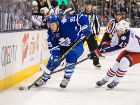 Toronto Maple Leafs defenceman Frank Corrado tries to get past Columbus Blue Jackets forward Scott Hartnell at the ACC in Toronto Wednesday, April 6, 2016. (Ernest Doroszuk/Toronto Sun/Postmedia Network)