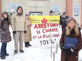 Barbara Ronson McNichol, foreground, and supporters gather outside the Sudbury Court House in Sudbury, Ont. on Wednesday April 6, 2016 following a judge's decision regarding the group's attempt to seek an injunction to stop logging in the Benny Forest northwest of Greater Sudbury. John Lappa/Sudbury Star/Postmedia Network