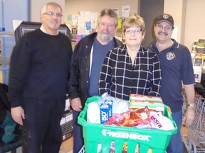 The Lucknow and District Lions donated $1,000 from its Sweetheart Draw to the North Huron Food Share Program, while the draw winner donated $115 of the $500 spree to the organization during March 31, 2016 shopping spree at Knechtels Food Market. Pictured L-R: Brian Knechtel, Dennis Biehn, Sweetheart Draw winner Donna Biehn and Lion Brian Evans. (Submitted)