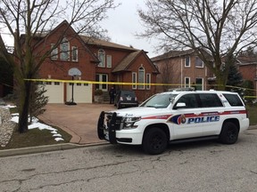 A York Regional Police SUV in front of a home where two bodies were discovered on Thursday, April 7, 2016 (Chris Doucette, Toronto Sun)
