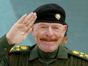 Ezzat Ibrahim al-Douri is seen during a military celebration in Baghdad in this February 16, 2003 file photo. REUTERS/Suhaib Salem/Files