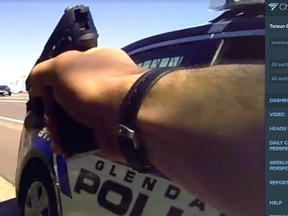 Bodycam shows officer shoot knife-wielding man (screen capture)