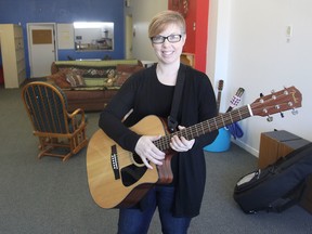 Shera Lumsden, founder and director of MusicMates, a music program for people with special needs, stands in the organization's new location next to the Collins Bay Legion branch in Kingston. An open house will be held this Saturday. (Michael Lea/The Whig-Standard)