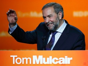NDP leader Tom Mulcair waves at the end of his concession speech after Canada's federal election in Montreal, Quebec on October 19, 2015. REUTERS/Mathieu Belanger