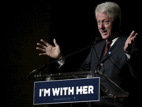 Former U.S. president Bill Clinton makes remarks at the Hillary Victory Fund "I'm With Her" benefit concert for his wife, U.S. Democratic presidential candidate Hillary Clinton, at Radio City Music Hall in the Manhattan borough of New York City, in this March 2, 2016 file photo.  Clinton angrily told Black Lives Matter protesters in Philadelphia April 7, 2016, that they "are defending the people who kill the lives you say matter" prompting criticism from black voters whose support Hillary Clinton is counting on in her quest for the presidency. REUTERS/Mike Segar/files
