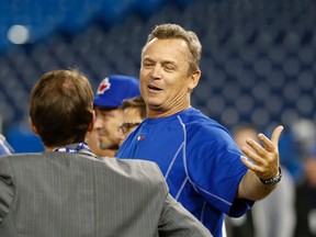 Blue Jays manager John Gibbons gestures while watching his players in the batting cage a day before the home opener at Rogers Centre in Toronto Thursday April 7, 2016. (Michael Peake/Toronto Sun/Postmedia Network)