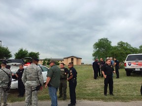 Bexar County Sheriff's deputies are seen inside Lackland Air Force Base in this image tweeted by @BexarCoSheriff in San Antonio, Texas, on April 8, 2016. Two people were killed in an apparent murder-suicide at Lackland Air Force Base in San Antonio on Friday that triggered a lockdown at the facility, the Bexar County Sheriff's Office said. (REUTERS/Bexar County Sheriff/Handout via Reuters)