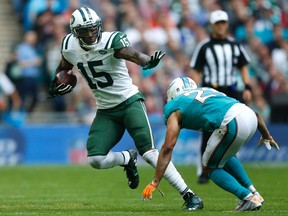 Jets receiver Brandon Marshall (left) was found not liable in a lawsuit brought by a woman who accused him of punching her in 2012. (Paul Childs/Action Images via Reuters)