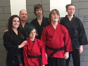 Submitted photo via Ali Stuart: Four students from Tiger Paw Martial Arts earned their black belts on the weekend. Pictured left to right: Back - Jason Turkington (Sensei/Owner of Tiger Paw), Chuck Stuart (Sensei). Front, Samantha Stokes (Sensei), Ewan MacDonald, Colm McGivern, and Madison Crawford.