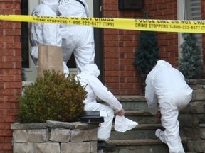 York Regional Police investigate a suspected murder-suicide after two adults were found dead in a Richmond Hill home Thursday. (CHRIS DOUCETTE/TORONTO SUN)