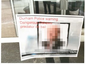 A blurred version of the poster that prompted Durham Regional Police to launch an investigation (police handout)