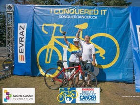 Sylvia and Graham Wood stand together after she participated in last year’s Enbridge Ride to Conquer Cancer. She will be hitting the 200-km track again this year to raise funds for the fight against cancer. - Photo supplied
