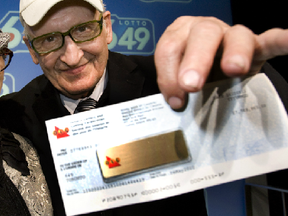 Peter Kaczmarczyk after collecting his lotto jackpot in 2010 (Sun file photo)