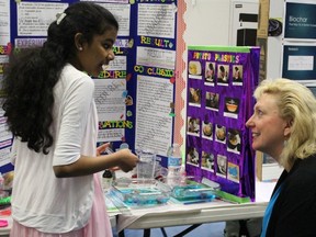 Rosedale student Madhumitha Parthiban discusses her green plastics experiment with Sarnia-Lambton MPP Marilyn Gladu at the Lambton County Science Fair Saturday. Close to 100 Sarnia-Lambton students showcased science projects ranging from new forms of energy production through to better hand sanitizers. Barbara Simpson/Sarnia Observer/Postmedia Network
