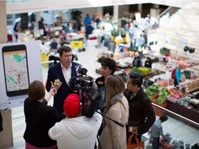 Agriculture and Forestry Minister Oneil Carlier unveiled a new smartphone app Saturday at the Edmonton City Market Downtown to help Albertans find out about the farmers markets and fresh produce in their area. Topher Seguin