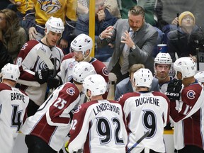 Colorado Avalanche coach Patrick Roy talks with his players during third-period NHL action against the Nashville Predators in Nashville, Tenn., on April 5, 2016. (AP Photo/Mark Humphrey)